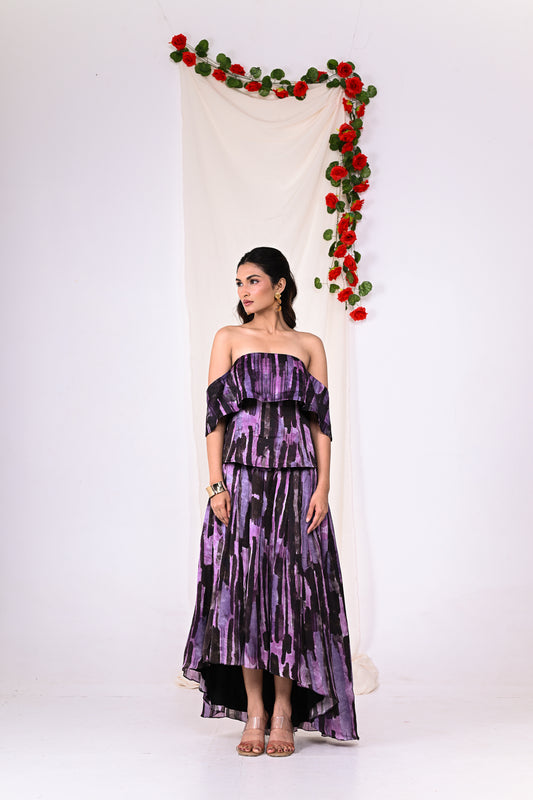 Purple off shoulder top with a high and low skirt