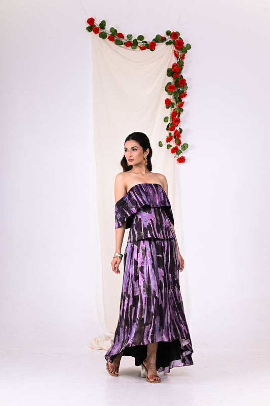 Purple off shoulder top with a high and low skirt